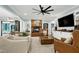 Spacious living room with cozy fireplace, neutral walls and comfortable seating at 168 E Deer, Apex, NC 27523
