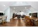 Spacious and open living room with hardwood floors, perfect for entertaining guests or relaxing at 168 E Deer, Apex, NC 27523