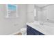 Cozy bathroom with a vanity with white countertop and commode at 172 Wellons Creek Dr, Garner, NC 27529
