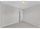 Neutral carpeted bedroom with attached closet at 172 Wellons Creek Dr, Garner, NC 27529