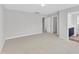 Neutral bedroom with carpet, multiple closets and an ensuite bathroom at 172 Wellons Creek Dr, Garner, NC 27529