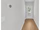 Entryway features a window in the front door and hard surface flooring throughout the home at 172 Wellons Creek Dr, Garner, NC 27529