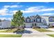 Inviting townhome showcasing a well-maintained lawn and driveway on a sunny day at 172 Wellons Creek Dr, Garner, NC 27529