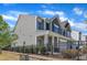 Tastefully designed townhome featuring appealing architectural elements and landscaping at 172 Wellons Creek Dr, Garner, NC 27529