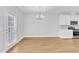 Bright kitchen area connected to eat-in area with sliding glass door for outdoor access at 172 Wellons Creek Dr, Garner, NC 27529