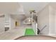 An unfinished attic with wood floors, a ceiling fan, and access to other rooms awaits customization at 1732 Bobwhite Ln, Rocky Mount, NC 27804