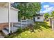 Backyard featuring a spacious deck, shed, and lush greenery, perfect for relaxation and outdoor activities at 1732 Bobwhite Ln, Rocky Mount, NC 27804