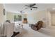 Inviting living room with sliding glass doors to the deck and ceiling fans at 1732 Bobwhite Ln, Rocky Mount, NC 27804