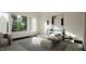 Bright bedroom with large windows, a comfortable bed, and contemporary artwork at 1802 Pershing Rd, Raleigh, NC 27608