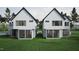 Modern home exterior with a well-manicured lawn and sleek architectural design at 1802 Pershing Rd, Raleigh, NC 27608