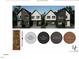 Rendering of new homes with gray and white siding and black trim at 1802 Pershing Rd, Raleigh, NC 27608