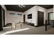 Comfortable living room with ample seating, a media center, and stylish design elements at 1802 Pershing Rd, Raleigh, NC 27608