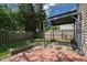 Backyard with a covered patio and a privacy fence at 1910 Falls Landing Dr, Raleigh, NC 27614