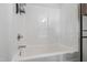 Bright white bathtub and shower at 1910 Falls Landing Dr, Raleigh, NC 27614