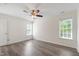 Bright bedroom featuring hardwood flooring, recessed lighting, and natural light at 1910 Falls Landing Dr, Raleigh, NC 27614