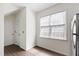 Bright kitchen area featuring white cabinets and a window for lots of natural light at 1910 Falls Landing Dr, Raleigh, NC 27614