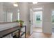 Charming entrance with modern console table, decor, and bright doorway showcasing natural light at 1913 Ballard Rd # 193, Fuquay Varina, NC 27526