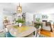 The dining room opens to the kitchen and living room creating a great flow between spaces at 2111 Woodland Ave, Raleigh, NC 27608