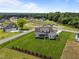 Suburban home with large, green lawn on an expansive lot at 25 Deer Tail Ln # 52, Fuquay Varina, NC 27526