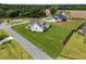 Aerial view of a new home and landscaping in a suburban neighborhood at 25 Deer Tail Ln # 52, Fuquay Varina, NC 27526