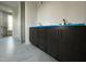Bathroom featuring a vanity with black hardware and a marble-look tile floor at 25 Deer Tail Ln # 52, Fuquay Varina, NC 27526