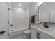 Well-lit bathroom with a shower-tub combo, star patterned tile, and modern fixtures at 25 Deer Tail Ln # 52, Fuquay Varina, NC 27526