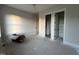 Spacious bedroom features large windows and walk-in closet at 25 Deer Tail Ln # 52, Fuquay Varina, NC 27526