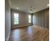 Spacious bedroom with hardwood floors, recessed lighting and lots of natural light at 25 Deer Tail Ln # 52, Fuquay Varina, NC 27526