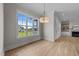 Dining room with ample natural light and views of a well-manicured lawn at 25 Deer Tail Ln # 52, Fuquay Varina, NC 27526