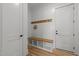 Mudroom features a bench, coat hooks, and ample storage, providing a practical entryway at 25 Deer Tail Ln # 52, Fuquay Varina, NC 27526