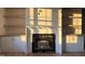 Close-up of a living room fireplace with custom built-in shelving and cabinetry for a cozy atmosphere at 25 Deer Tail Ln # 52, Fuquay Varina, NC 27526