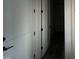 Hallway features white doors with black hardware at 25 Deer Tail Ln # 52, Fuquay Varina, NC 27526