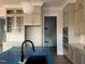 Kitchen with custom cabinets, an island with a sink, and stainless steel appliances at 25 Deer Tail Ln # 52, Fuquay Varina, NC 27526