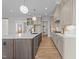 Bright kitchen with a large island, stainless steel appliances, and open layout at 25 Deer Tail Ln # 52, Fuquay Varina, NC 27526