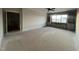 A spacious living room features built-in shelving and abundant natural light, perfect for comfortable living and entertaining at 25 Deer Tail Ln # 52, Fuquay Varina, NC 27526
