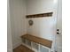 Well-organized mudroom with built-in bench, storage, and coat hooks, blending form and function at 25 Deer Tail Ln # 52, Fuquay Varina, NC 27526