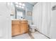 Bathroom featuring wood vanity with cultured marble countertop and a tile floor at 2506 Blooming St, Raleigh, NC 27612