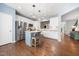 Bright kitchen with white cabinets, stainless steel appliances, and a center island at 2506 Blooming St, Raleigh, NC 27612