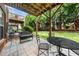 Cozy outdoor patio with comfortable seating, perfect for relaxing or entertaining at 2506 Blooming St, Raleigh, NC 27612