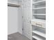 Walk-in closet featuring ample shelving and a clothes rod at 2506 Blooming St, Raleigh, NC 27612