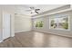 Spacious main bedroom with trey ceiling and multiple windows for ample natural light at 2513 Magnolia Tree Ln, Durham, NC 27703