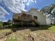 Image of the back of the house featuring a wooden deck and a staircase to the backyard at 269 Deer Tail Ln # 44, Fuquay Varina, NC 27526