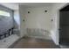 Unfinished bathroom with tiled shower, modern fixtures, and bright natural light at 269 Deer Tail Ln # 44, Fuquay Varina, NC 27526