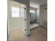 Modern bathroom featuring a tiled shower, recessed lighting, and a neutral color scheme at 269 Deer Tail Ln # 44, Fuquay Varina, NC 27526
