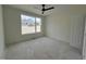 Bedroom featuring a large window with a scenic view, providing ample natural light at 269 Deer Tail Ln # 44, Fuquay Varina, NC 27526