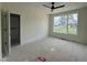 Bright bedroom with a large window, offering natural light and neighborhood views at 269 Deer Tail Ln # 44, Fuquay Varina, NC 27526