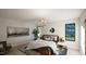 Relaxing primary bedroom with a king bed, artwork, and natural light at 269 Deer Tail Ln # 44, Fuquay Varina, NC 27526