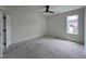 Spacious bedroom with a window providing plenty of natural light and neighborhood views at 269 Deer Tail Ln # 44, Fuquay Varina, NC 27526