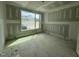 Unfinished bedroom featuring large windows and ample natural light at 269 Deer Tail Ln # 44, Fuquay Varina, NC 27526