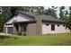 Exterior of modern home with natural light and professionally landscaped yard at 269 Deer Tail Ln # 44, Fuquay Varina, NC 27526